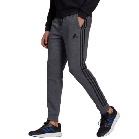 Spodnie adidas Essentials Tapered Cuff 3 Stripes M GK8826 Spodnie adidas Essentials Tapered Cuff 3 Stripes M GK8826