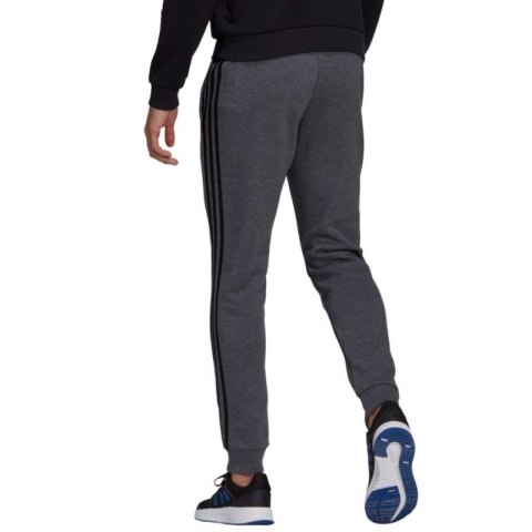 Spodnie adidas Essentials Tapered Cuff 3 Stripes M GK8826 Spodnie adidas Essentials Tapered Cuff 3 Stripes M GK8826